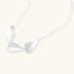 Minimalist sterling silver necklace with three brushed leaf-shaped pendants on delicate chain against white background