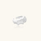 Brushed sterling silver ring with organic wave-like edges and adjustable cuff design on white background