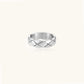 Braided stainless steel band ring with geometric interwoven strands in brushed silver finish on white background