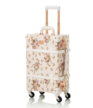 Beige floral Botanica carry-on suitcase by COTRUNKAGE with a hard shell, compact size, and modern floral design.