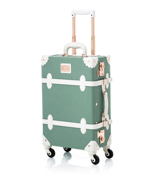 COTRUNKAGE Riviera Carry-on Set train case with handle, compact design, black exterior, and multiple compartments for travel storage.