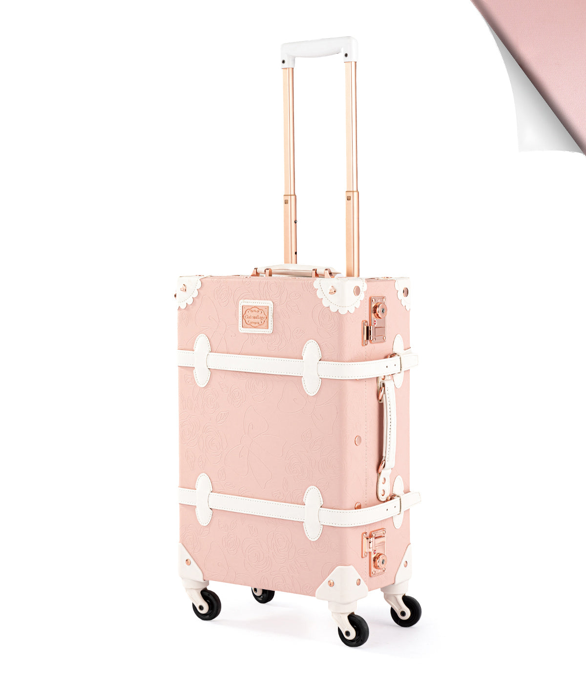COTRUNKAGE Botanica Carry-on with embossed pink floral design, lightweight travel suitcase with handle and wheels.