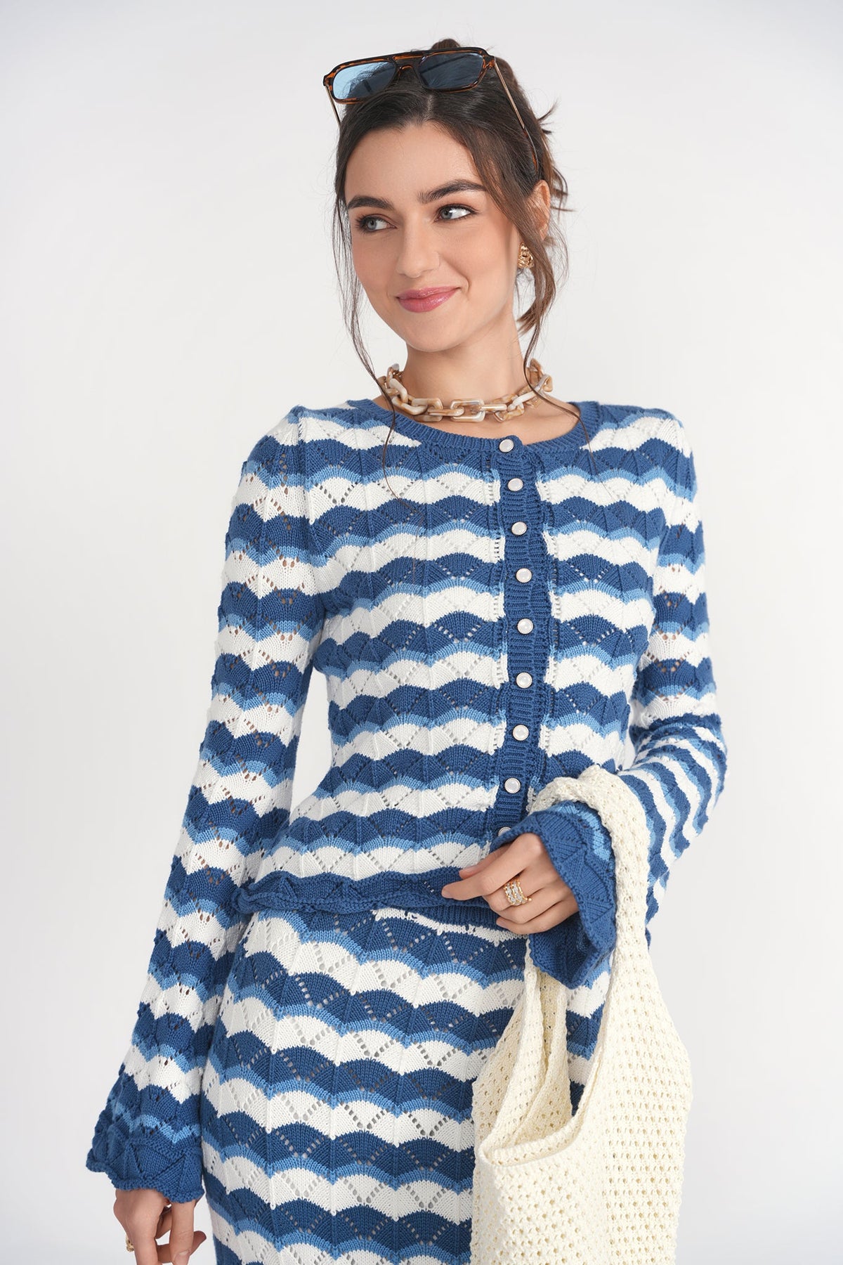 Blue Making Waves crochet top by Adina Las Vegas featuring a stylish, textured design and a relaxed fit.