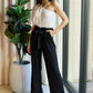 Dress Day Marvelous in Manhattan One-Shoulder Jumpsuit in White/Black - Farnelli