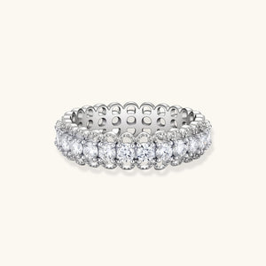 Elegant FARNELLI Infinite Sparkle ring with shimmering stones, showcasing a sleek silver band and dazzling design.