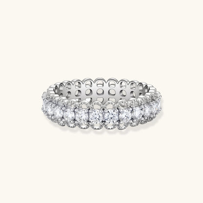 Elegant FARNELLI Infinite Sparkle ring with shimmering stones, showcasing a sleek silver band and dazzling design.