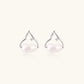 Silver mountain outline studs with baroque pearl and diamond accent on white background