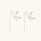 Delicate sterling silver dragonfly earrings with textured wings and curved threader hooks on white background