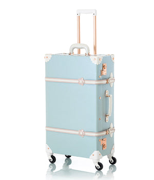 Sky blue COTRUNKAGE Minimalism XL Check-in spinner suitcase with four wheels and sleek design.