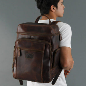 Alpha Brown Buffalo Leather Travel Backpack by Classy Leather Bags, showing durable leather with adjustable straps and spacious main compartment.