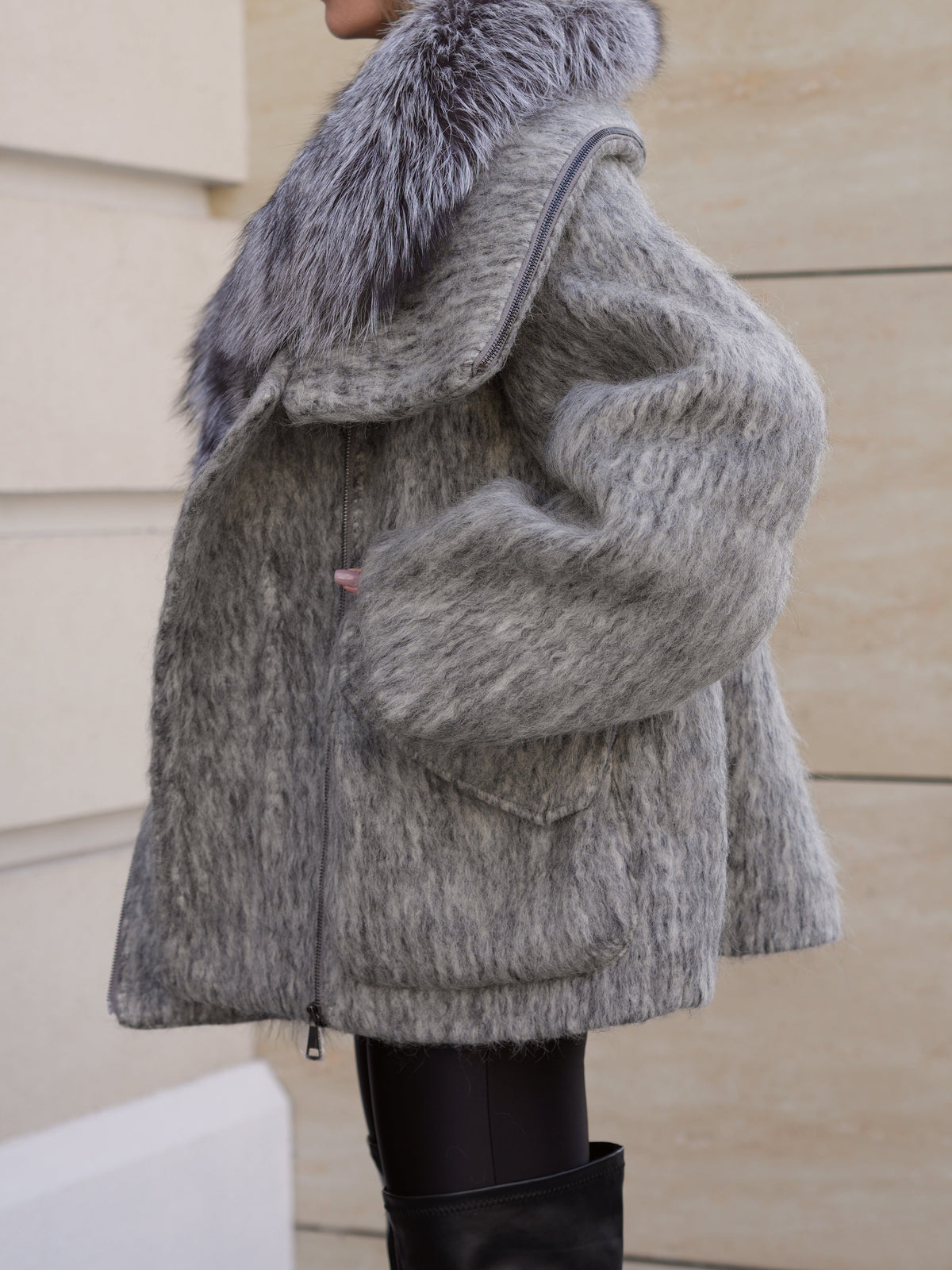 Ares Alaska Outerwear Company genuine fur trim down fill mohair parka coat in close-up view