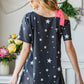 Heimish Full Size Star Print Asymmetrical Neck Short Sleeve Top - Farnelli