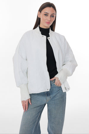 Alaska® Outerwear Mia Light White Jacket displayed on a hanger, showcasing its sleek design and lightweight fabric.