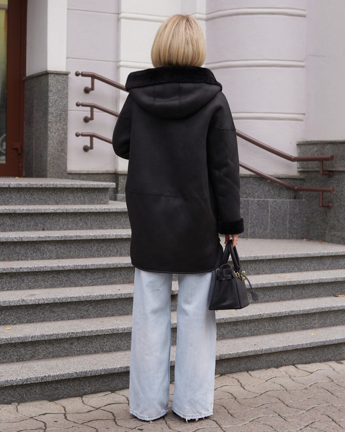 Alaska Grazia reversible black faux shearling hooded coat with parka-style silhouette