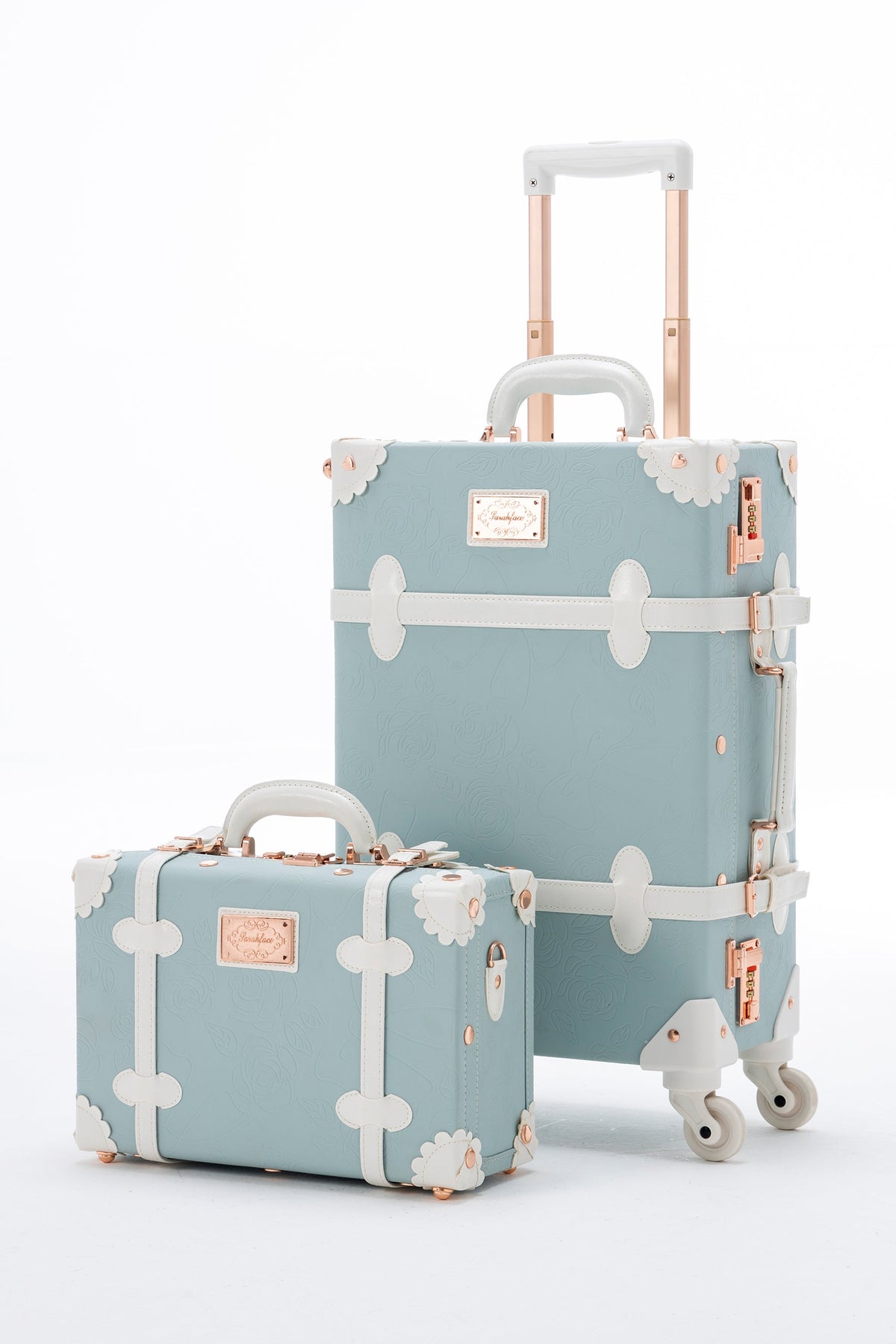 Blue embossed COTRUNKAGE SarahFace 2-piece luggage set with hard shells and retractable handles on a white background.