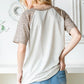Heimish Full Size Animal Print Half Button Short Sleeve Top - Farnelli