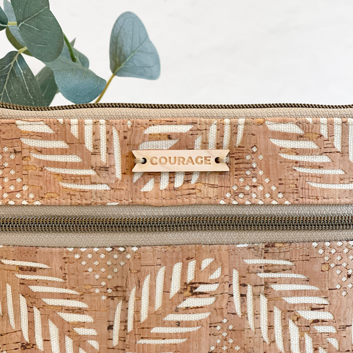 Cream GUARDIAN belt bag by Carry Courage with adjustable strap and secure zip pocket