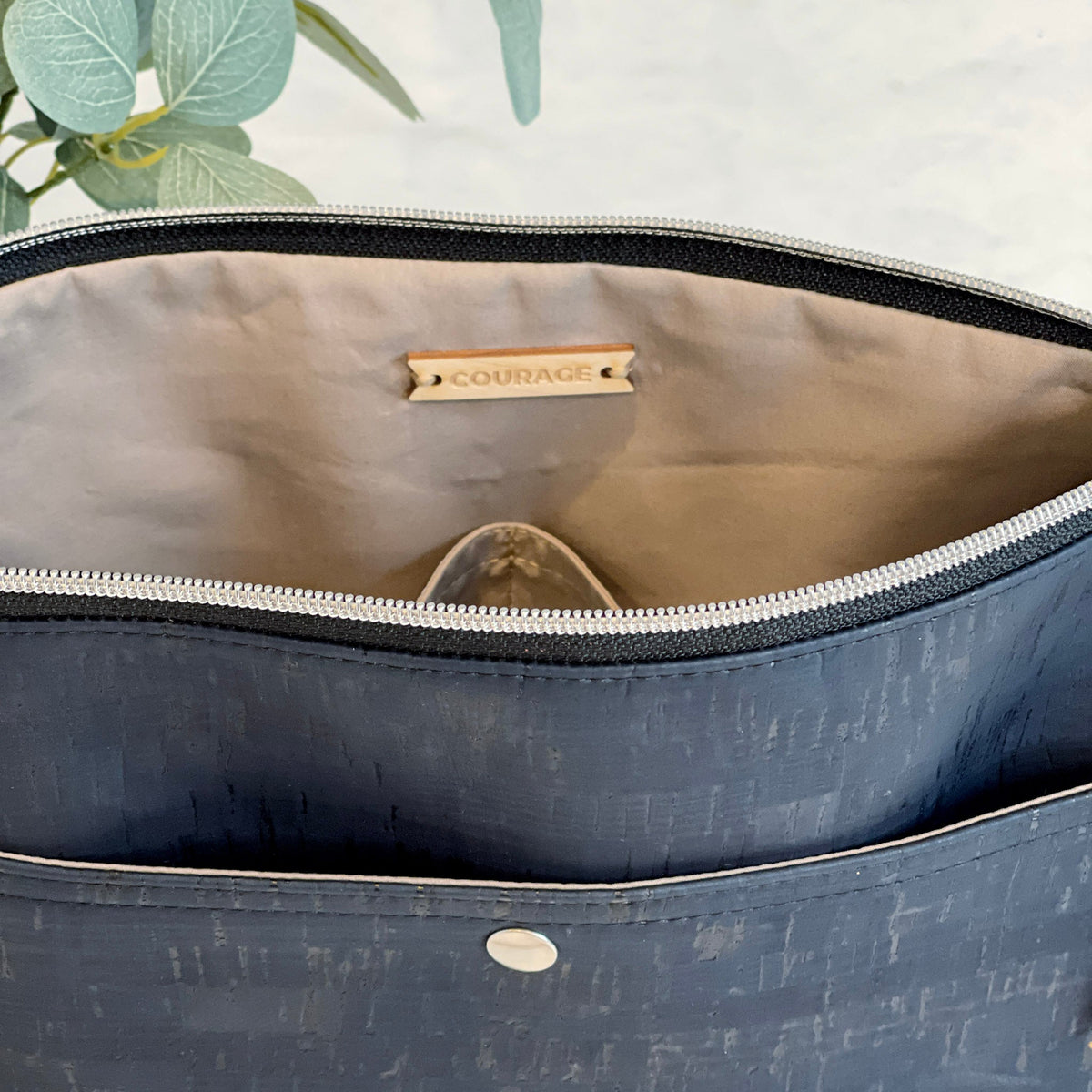 Carry Courage VISIONARY crossbody bag in coal black, compact rectangular design with adjustable strap
