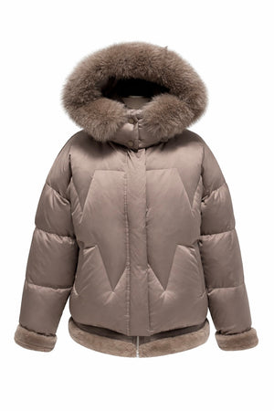 Alaska® Outerwear Company genuine polar fox down fill coat, a warm winter parka with a sleek design and plush fur trim.