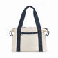 ARTI cream duffle bag with spacious main compartment and sturdy handles