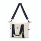 ARTI cream duffle bag with spacious design and sturdy handles
