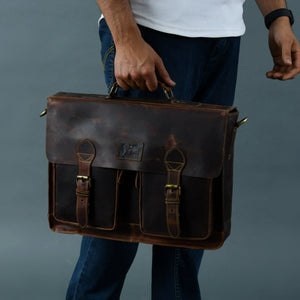 Classy Leather Bags Wall Street Briefcase messenger bag with leather handle and adjustable shoulder strap on a plain background