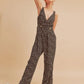 Aemi + Co Ditsy Floral Surplice Sleeveless Wide Leg Jumpsuit - Farnelli