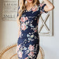 Heimish Full Size Ruched Floral Mini Dress Plus Size - Farnelli