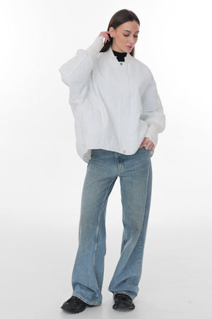 Alaska® Outerwear Company Mia light white jacket with a sleek design, lightweight fabric, and front zipper.