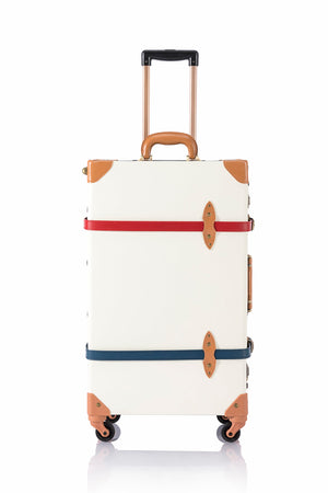COTRUNKAGE SarahFace spinner suitcase in green with pearl accents, featuring four wheels and a modern, stylish design.