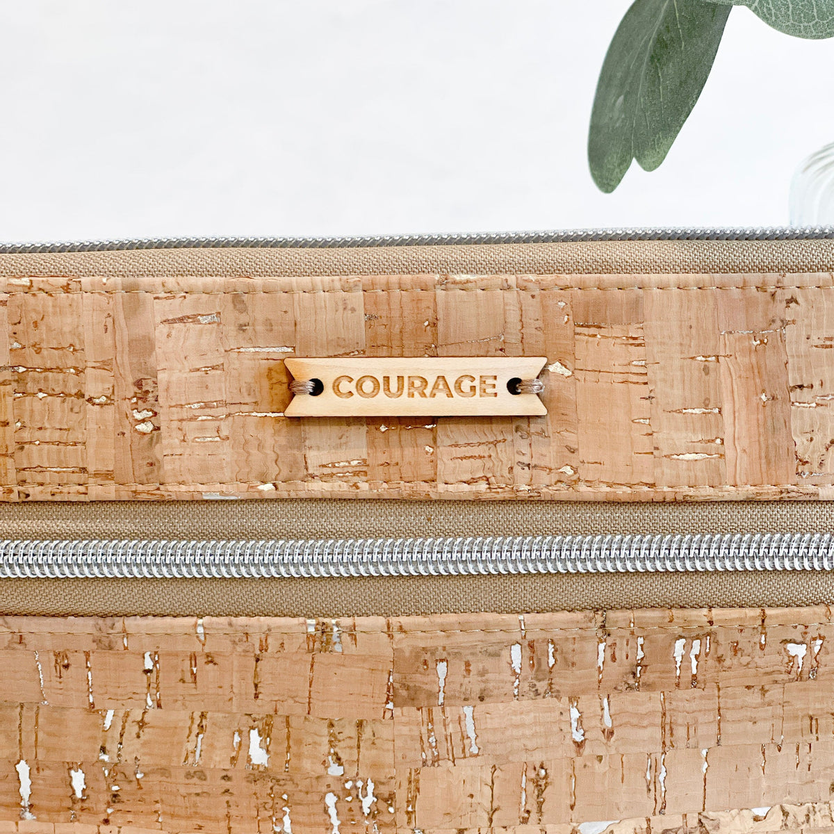 Carry Courage GUARDIAN silver belt bag with sleek metallic finish and adjustable strap