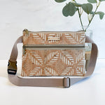 Carry Courage GUARDIAN belt bag in cream, compact crossbody design with adjustable strap