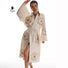Blue evil eye inspired boho chic caftan by Miyawfashion, flowing fabric with intricate patterns and vibrant colors.