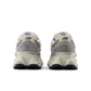 Men's New Balance 9060 lifestyle shoes in grey and brown, stylish sneakers with a modern design and textured sole.