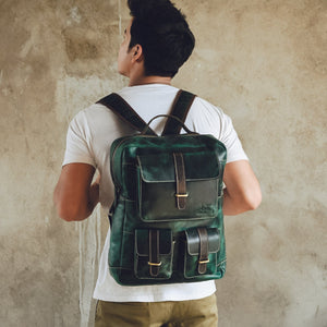 Greenfield leather backpack by Classy Leather Bags, showing a stylish green leather backpack with adjustable straps and front pocket.