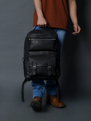 Classy Leather Bags NoirTrek Leather Backpack 2.0 with sturdy leather construction and adjustable straps, front pocket, and top handle.