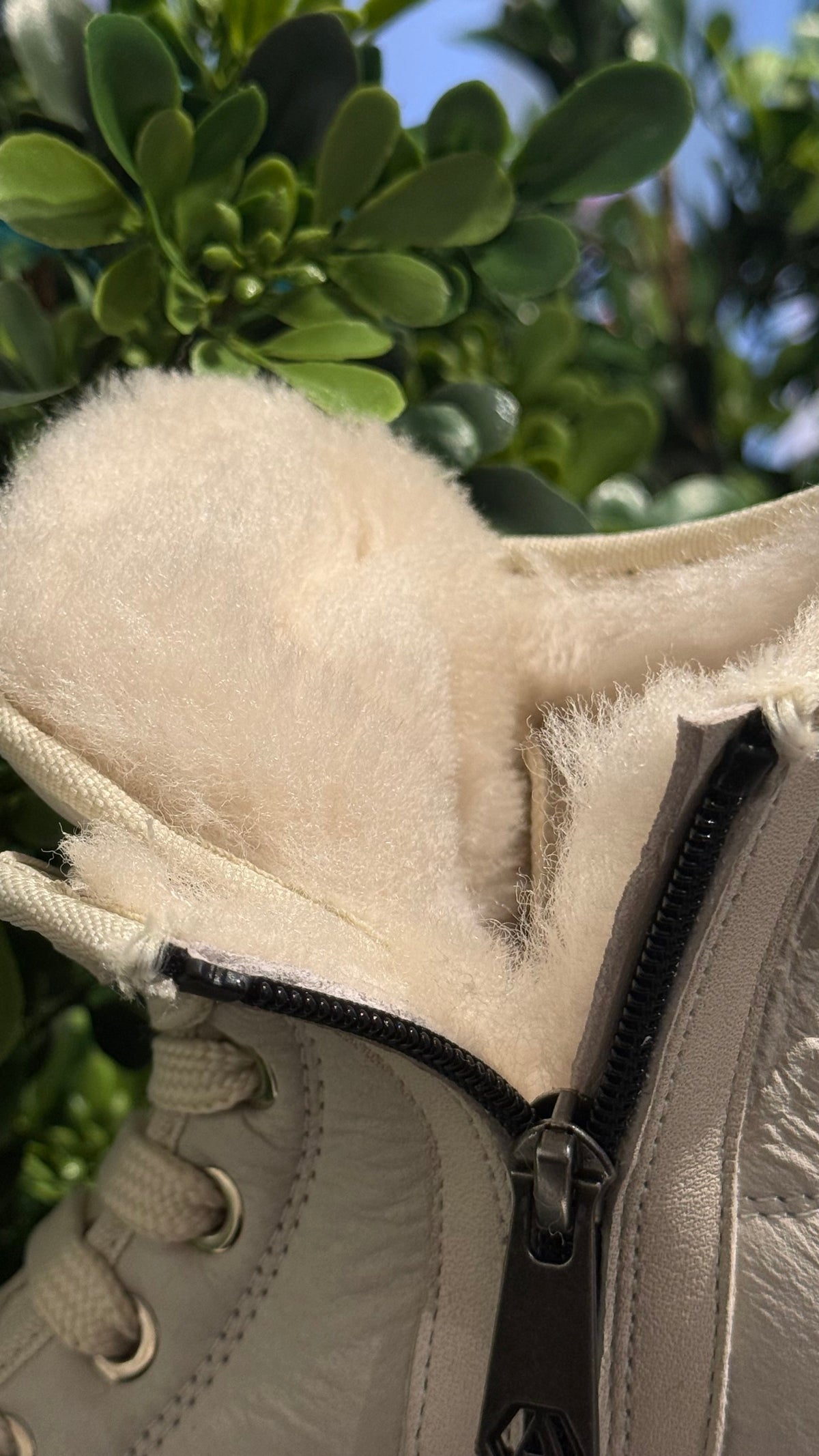 Alaska® Outerwear Company Aspen genuine shearling lined winter boots, black with rugged sole and cozy shearling interior.