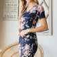 Heimish Full Size Ruched Floral Mini Dress Plus Size - Farnelli