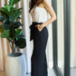 Dress Day Marvelous in Manhattan One-Shoulder Jumpsuit in White/Black - Farnelli