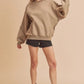 Aemi + Co Exposed Seam Round Neck Drop Shoulder Sweatshirt - Farnelli