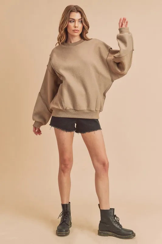Aemi + Co Exposed Seam Round Neck Drop Shoulder Sweatshirt - Farnelli
