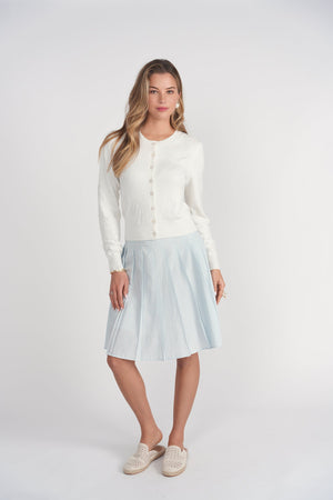 White floral open stitch cardigan top by Adina Las Vegas, featuring lightweight, airy knit with floral pattern and open front design.