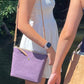 Carry Courage VISIONARY cross body bag in amethyst purple, shown from the front with adjustable strap