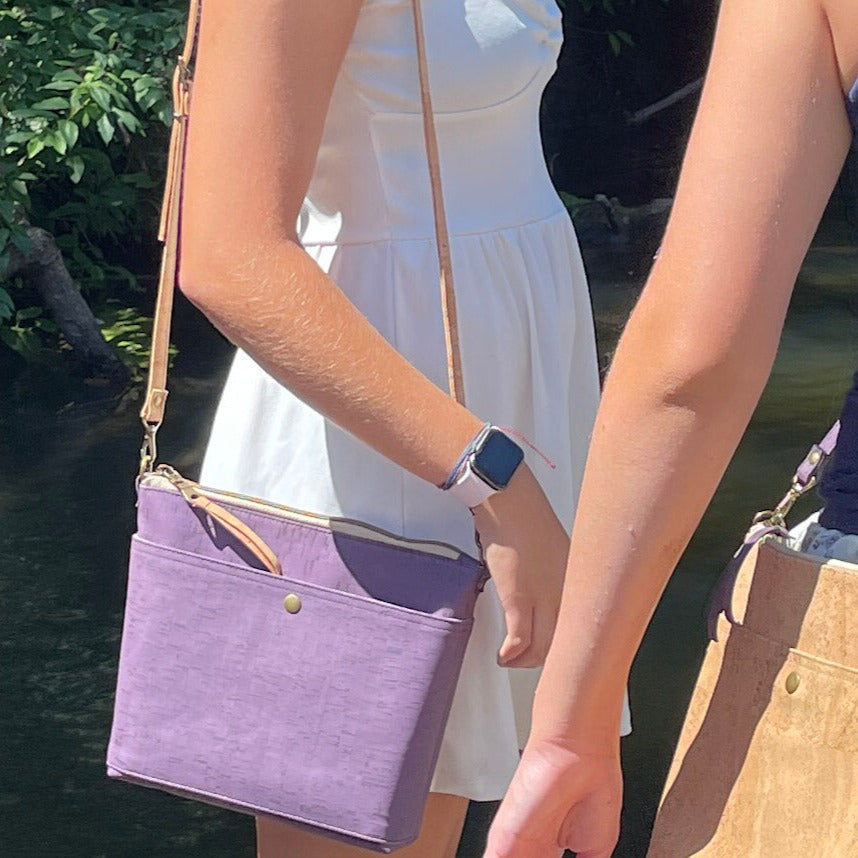 Carry Courage VISIONARY cross body bag in amethyst purple, shown from the front with adjustable strap