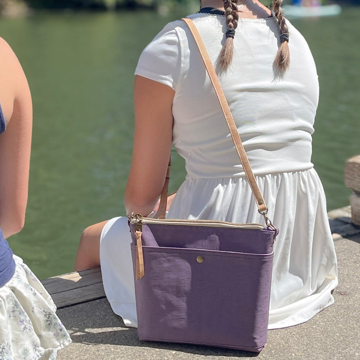 VISIONARY cross body bag in amethyst by Carry Courage, featuring an adjustable strap and compact design
