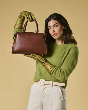 Brown Zita Italian calf leather women's handbag with shoulder strap, stylish leather bag with elegant design and adjustable strap.