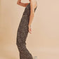 Aemi + Co Ditsy Floral Surplice Sleeveless Wide Leg Jumpsuit - Farnelli