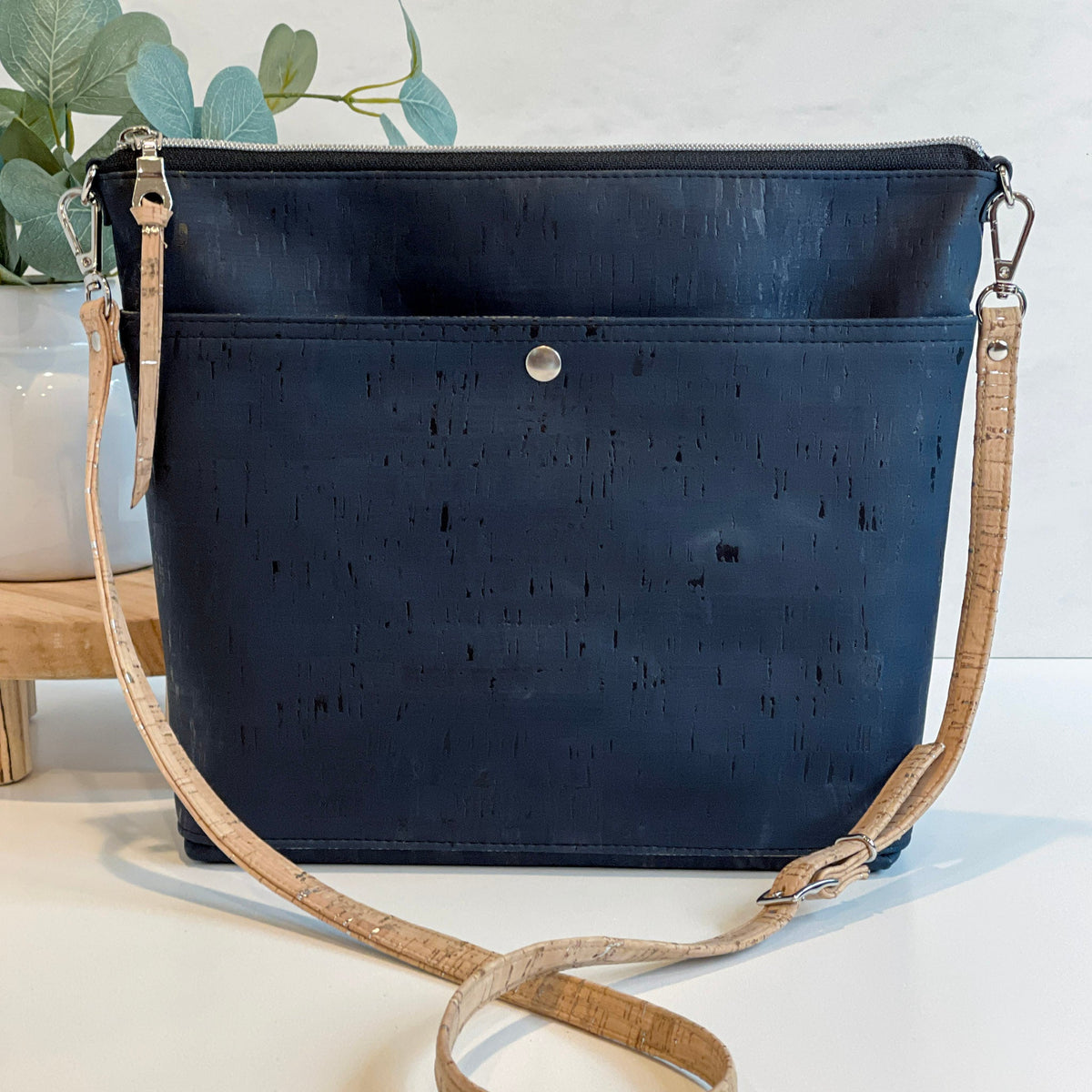 VISIONARY crossbody bag by Carry Courage in coal black, shown from the front