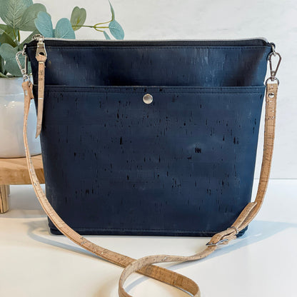 VISIONARY crossbody bag by Carry Courage in coal black, shown from the front