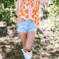 Alison Ruffled Sleeve Smocked Floral Top - Farnelli